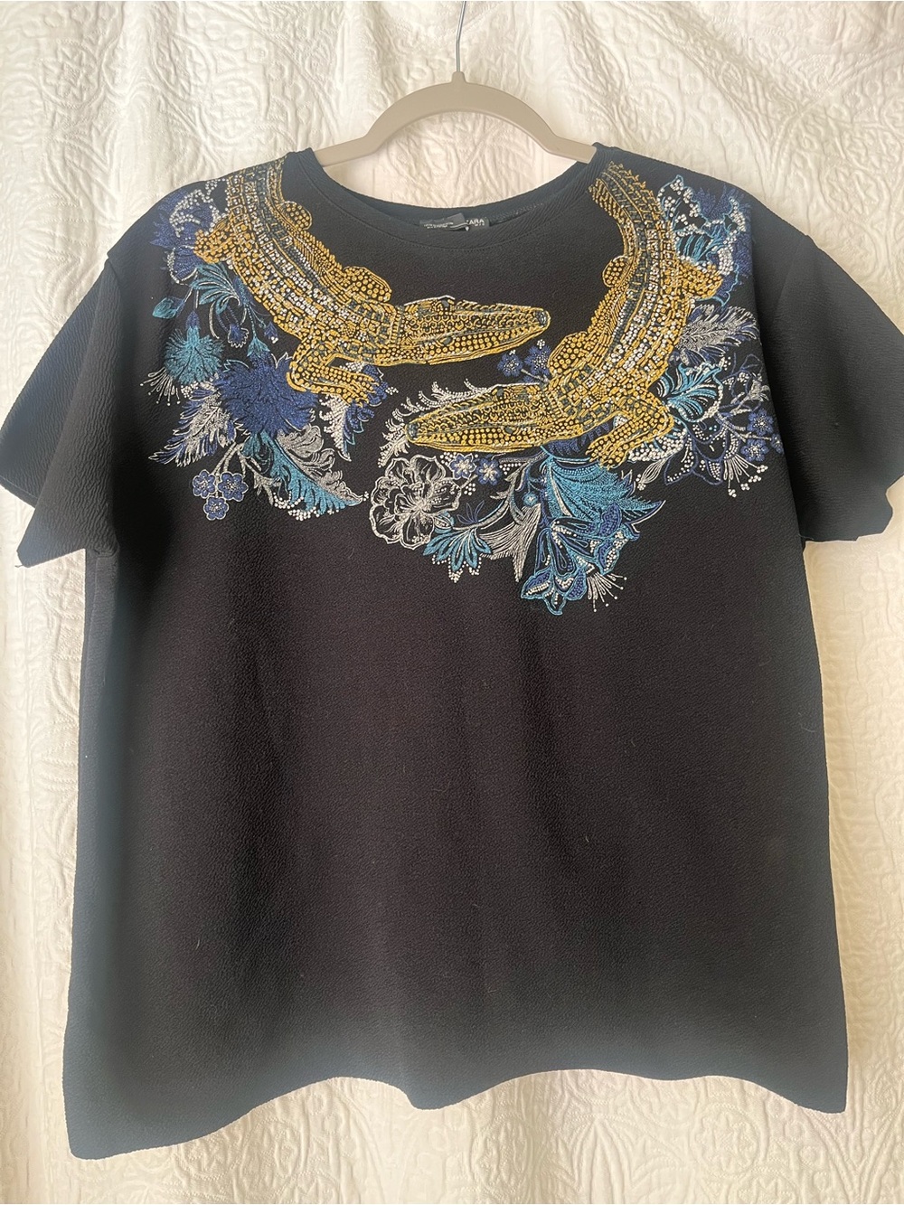 Zara Black Tee with Gold Croc Embellishment and Blue Floral Design